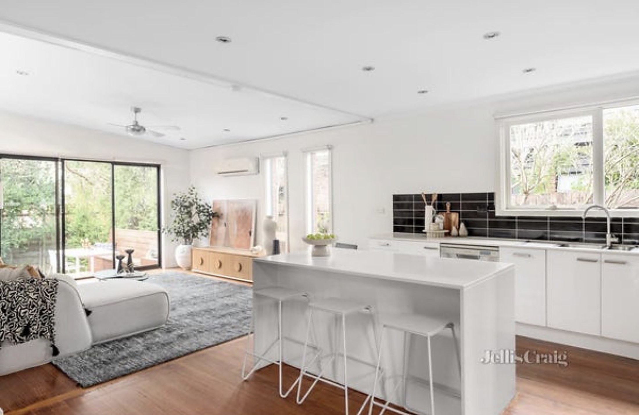 The open-plan kitchen and living area at Viewbank House with garden outlook